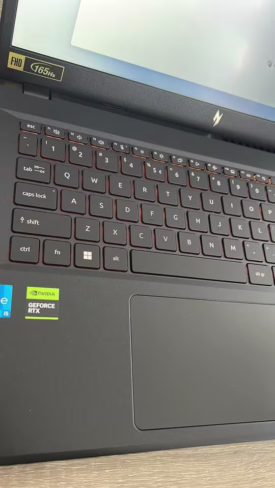 Acer V15 Core i5 RTX 5050 graphics, featuring backlit RGB keyboard and large precision trackpad, 165Hz FHD display