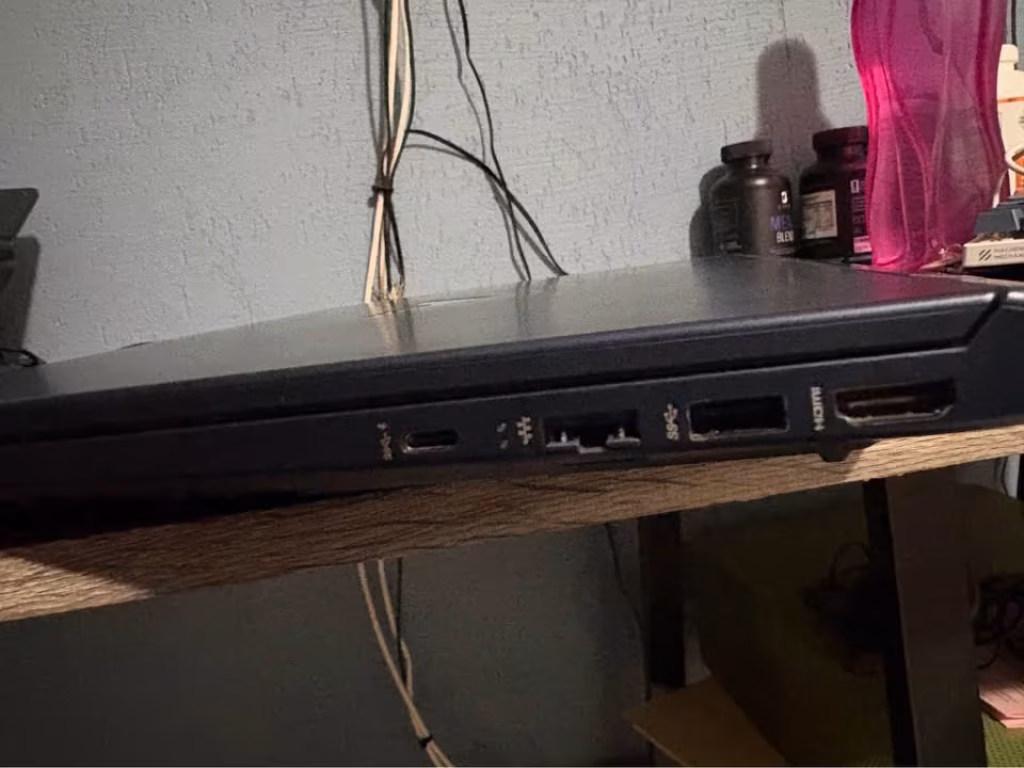 HP Victus Core i7 RTX 5050 right side ports close-up featuring USB Type-C, RJ45 Ethernet, USB Type-A, HDMI port, and cooling grill for connectivity and thermal airflow.