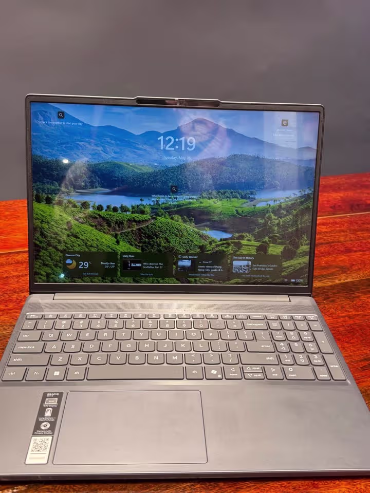 Lenovo IdeaPad Slim 3 Core i7 laptop front view showing the speaker grill above the keyboard, silver metallic finish