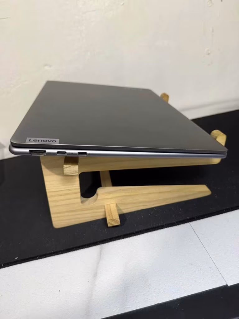 Lenovo Yoga Slim 7 Snapdragon X Elite laptop left side ports showing HDMI and dual USB-C Thunderbolt connectors