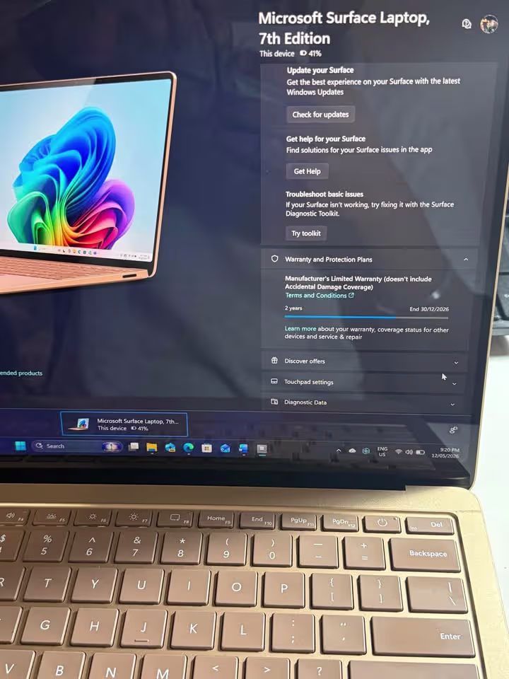 Microsoft Surface Laptop 7th Edition in Rose Gold showing 41% battery life on the Windows settings screen