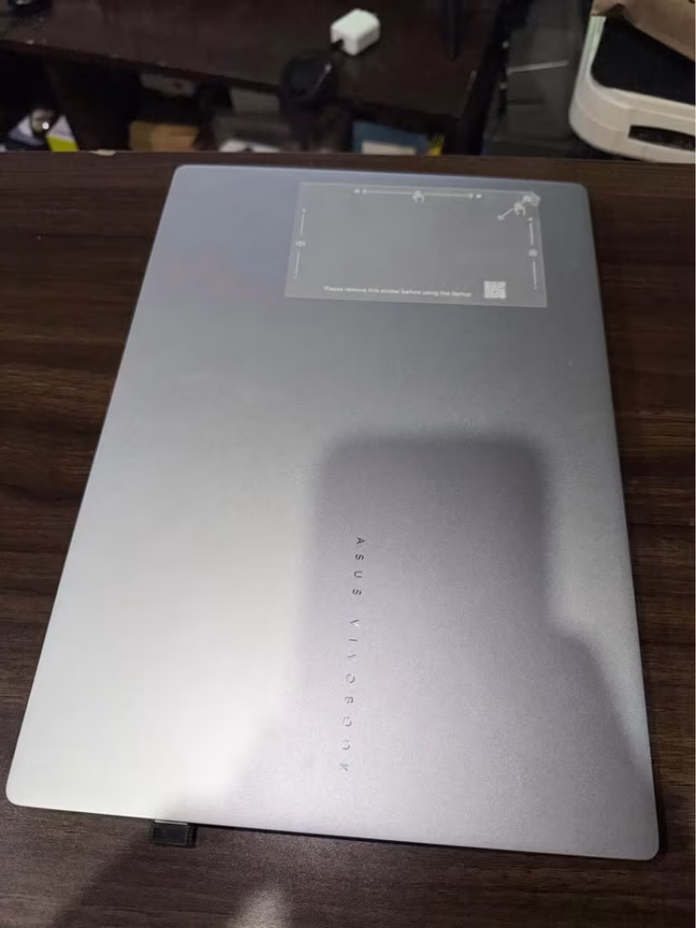 ASUS Vivobook 14 laptop close-up rear view showing the silver rear panel