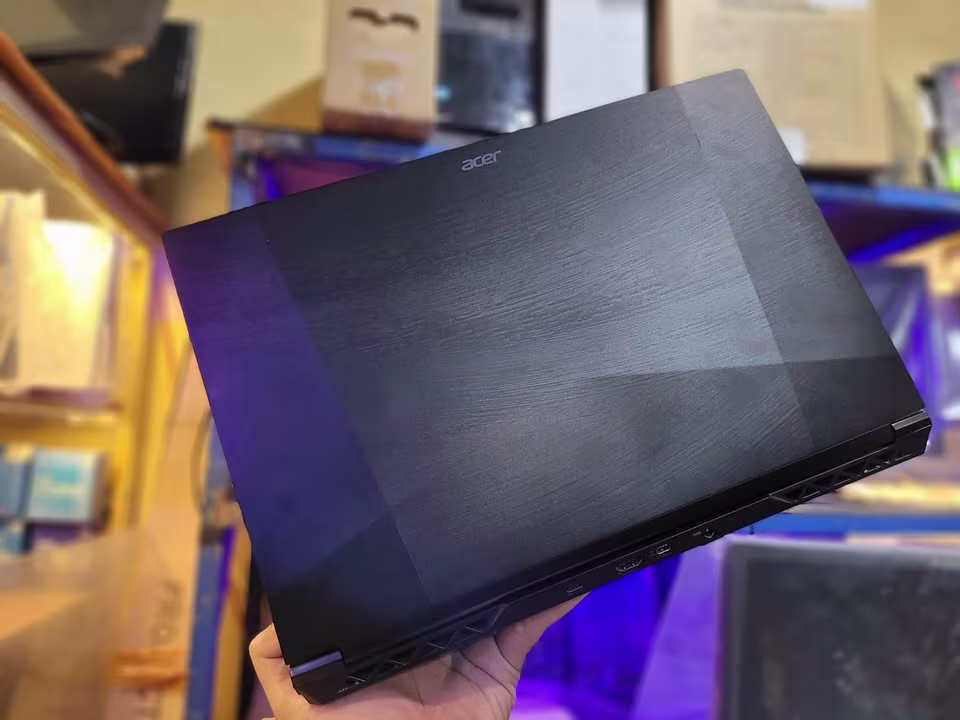 Acer ALG Core i5 RTX 3050 laptop rear cover in close view, featuring a brushed metal aluminum-style finish