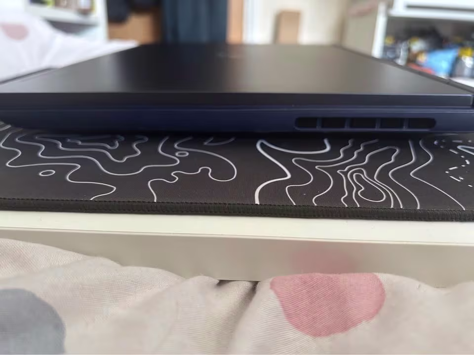 Alienware 16 Aurora Core 5 laptop right side view showing cooling thermal vents