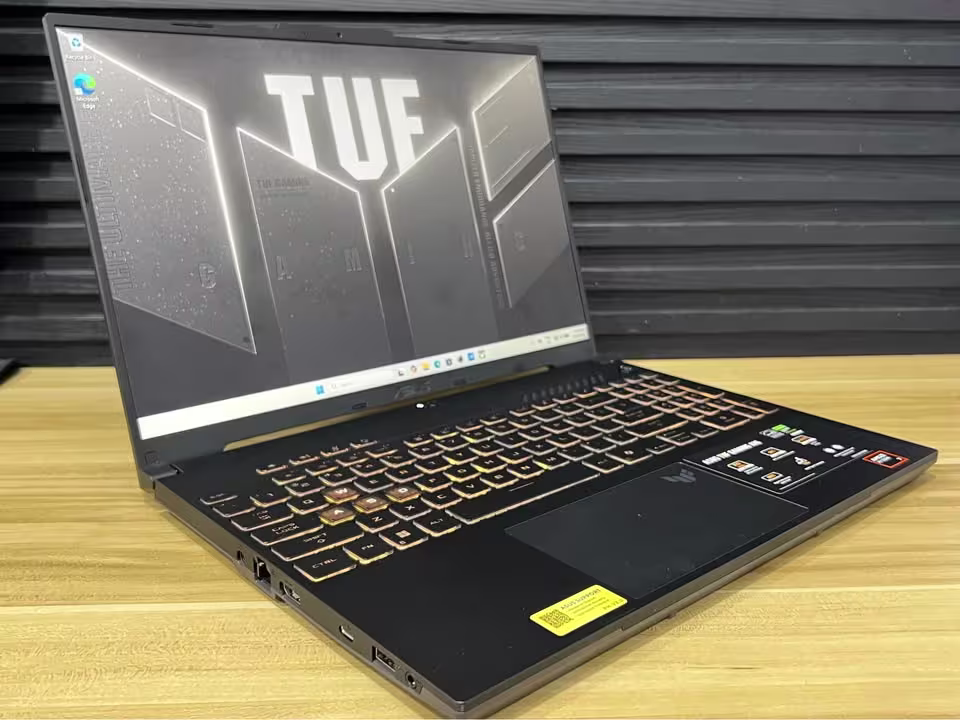 ASUS TUF A16 Ryzen 7 gaming laptop showing its left side with RJ-45 Ethernet LAN, HDMI 2.0, USB Type-C, USB Type-A, and 3.5 mm audio ports