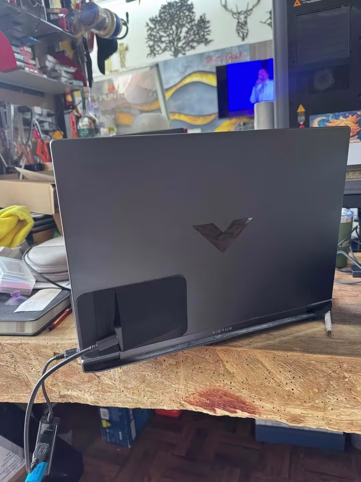 HP Victus AMD Ryzen 7 RTX 4050 laptop rear view ventilation area, and sturdy body design
