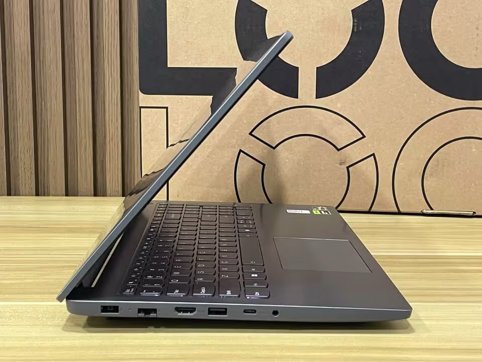 Lenovo LOQ Essential Ryzen 7 RTX 4050 laptop showing right-side ports including DC-in, RJ45 Ethernet, HDMI 2.1, USB Type-A, USB Type-C, and audio combo jack