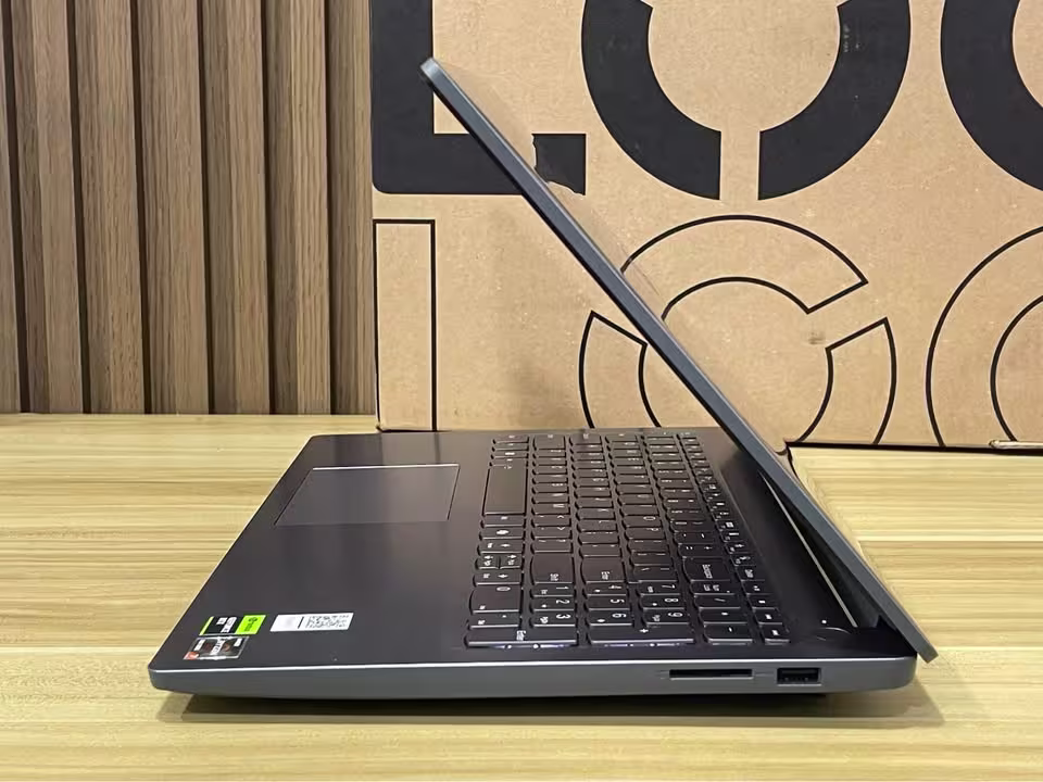 Lenovo LOQ Essential Ryzen 7 RTX 4050 laptop right side showing SD card reader and USB A port